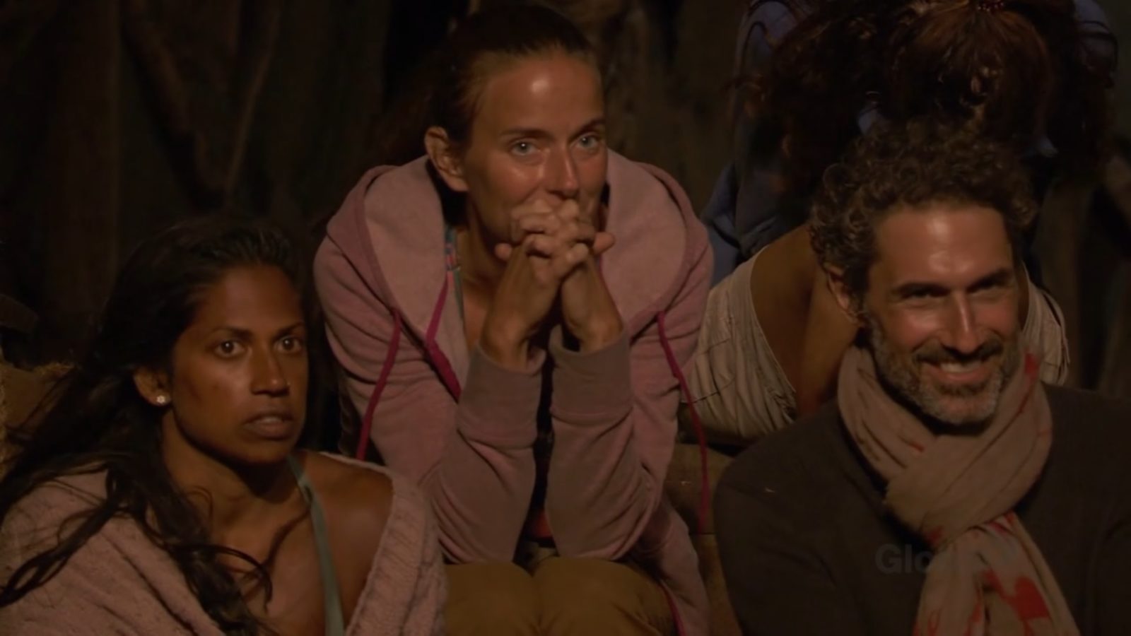 Natalie, Amber, and Ethan watch the Tribal Council chaos on Survivor: Winners at War