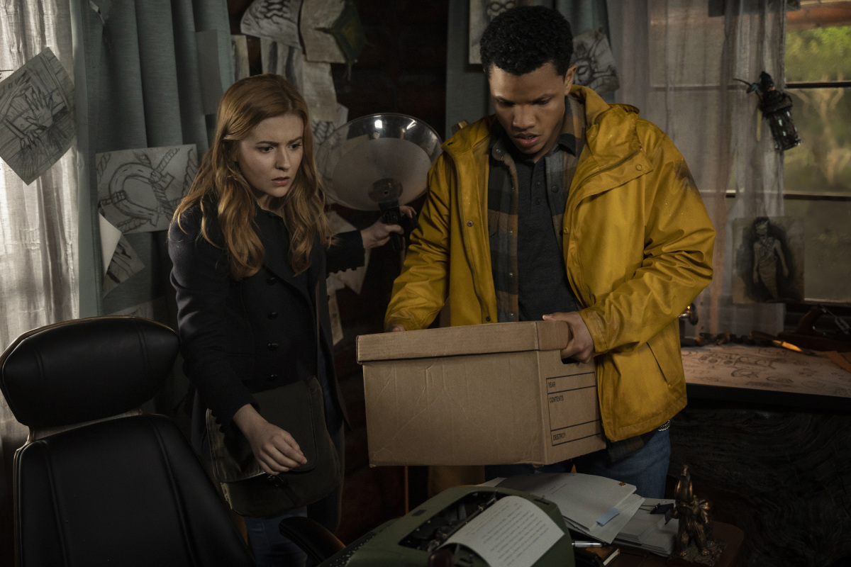 Nancy and Nick explore AJ's box of research on Nancy Drew