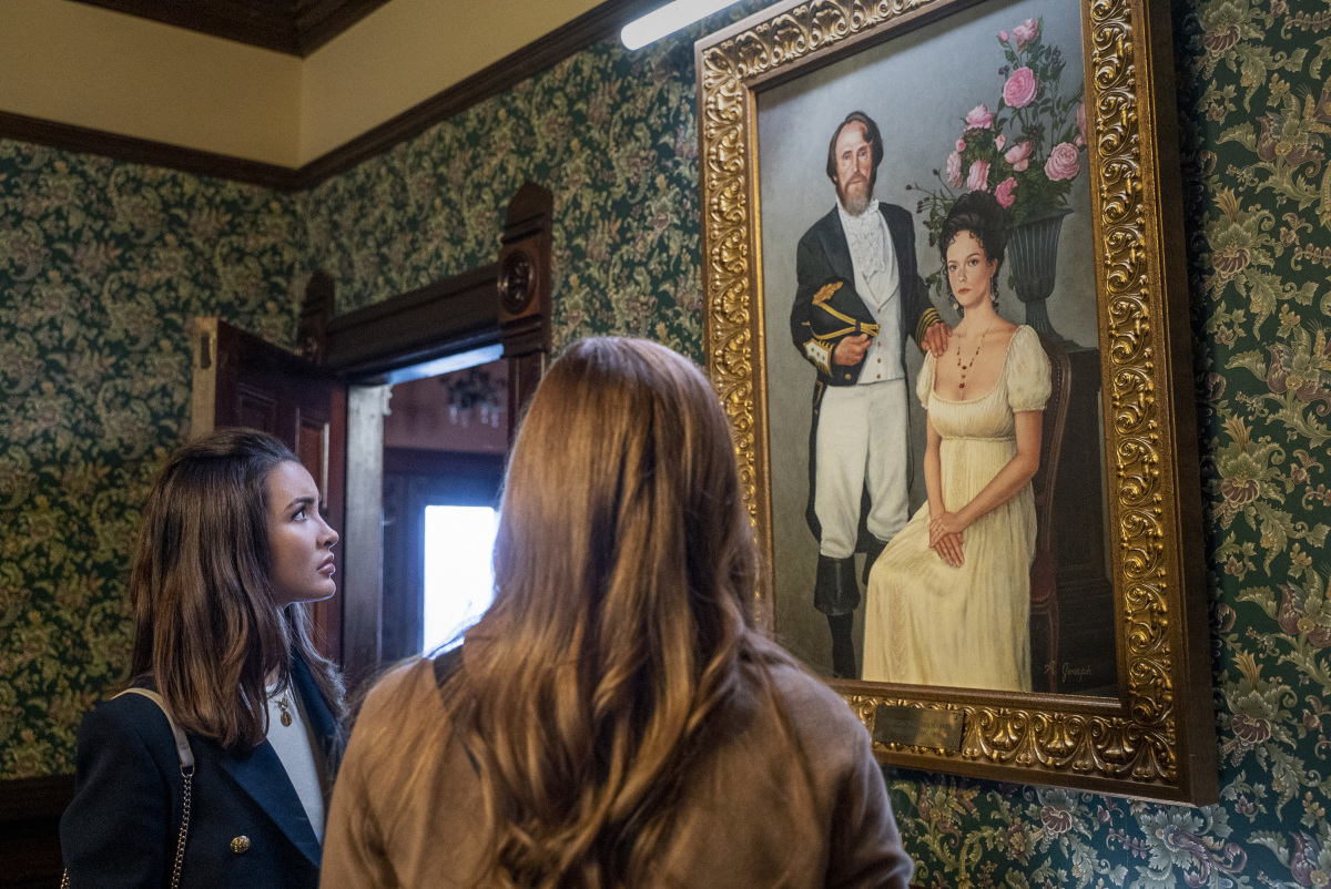 Nancy and Bess viewing a historical painting on Nancy Drew