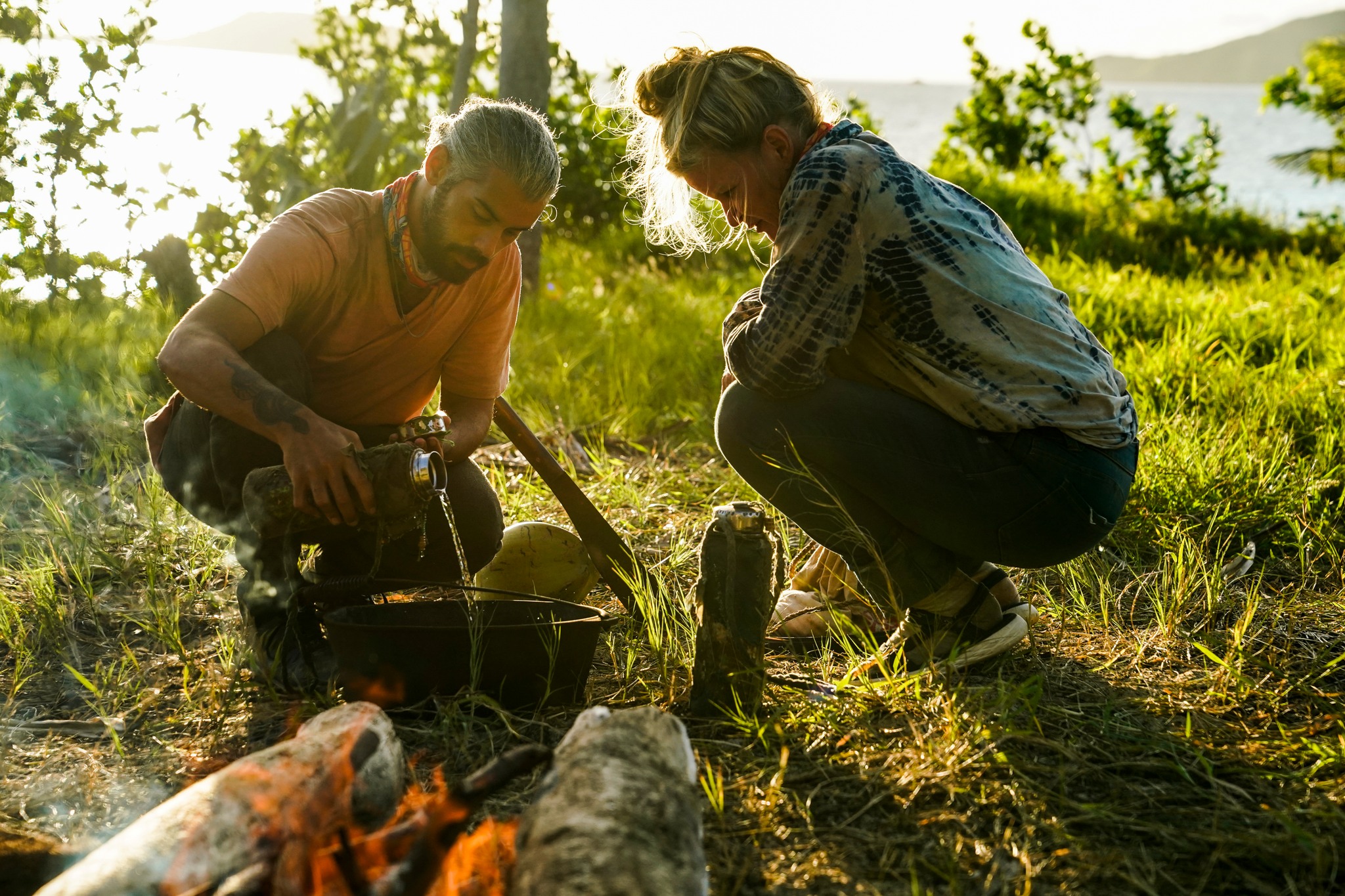 Ricard and Heather lighting a fire on Survivor 41